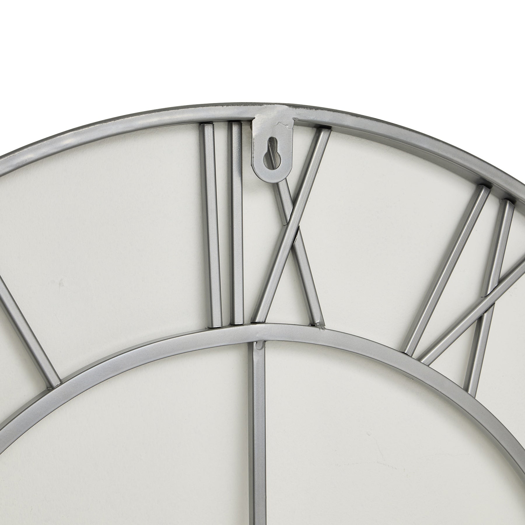 Close-up of Silver Skeleton Wall Clock, showcasing elegant metal design, part of our Luxury Designer Furniture collection for modern home decor.