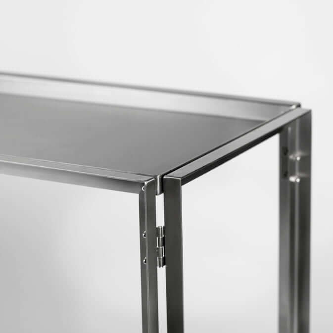 Foldable Console in brushed stainless steel, a sleek addition to luxury and designer furniture collections for modern home decor.