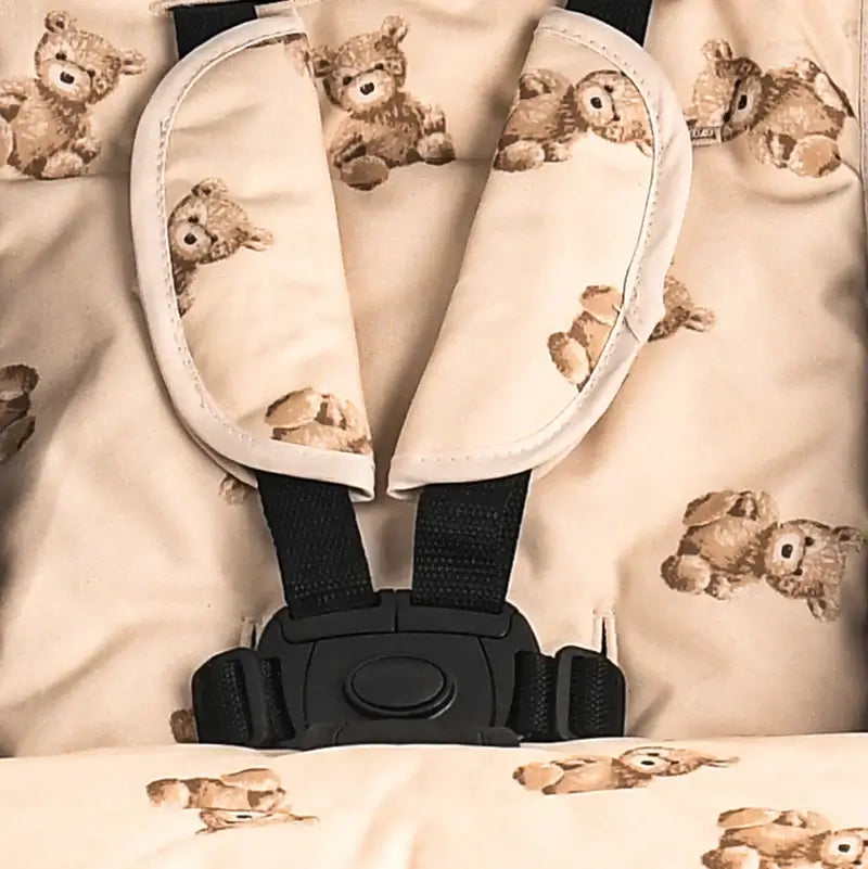 Teddy cream fabric of the Roma Rizzo 2 stroller, showcasing its luxury and designer appeal with cute bear pattern. Ideal for modern parents.