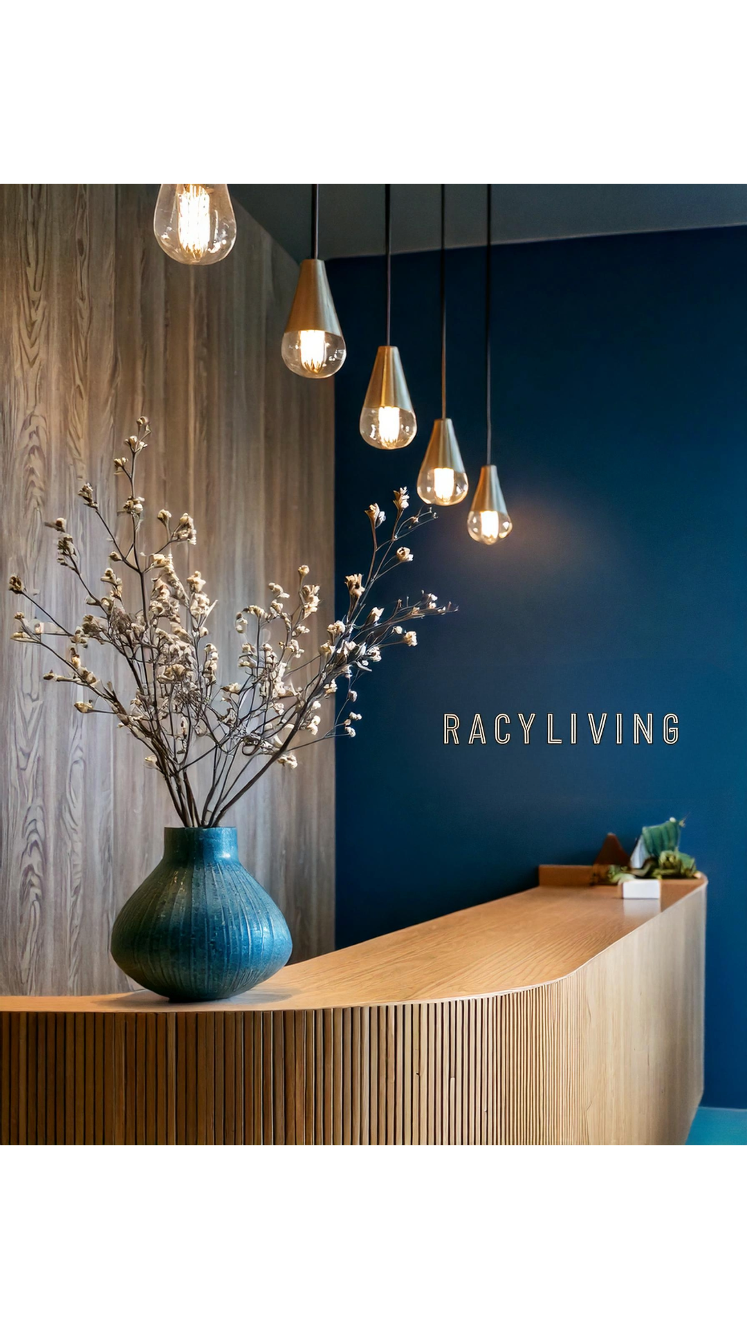 Modern interior design with blue vase and pendant lights at a stylish reception area.