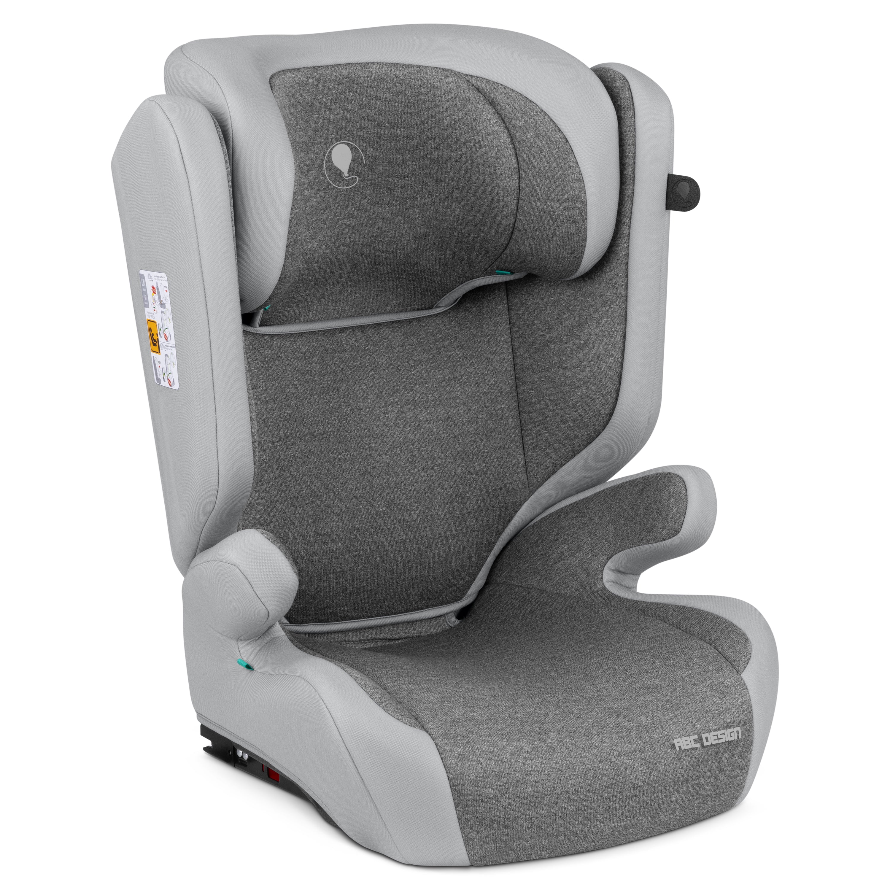 Gray and light green child car seat with safety labels and ergonomic design.