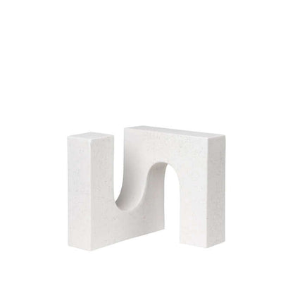 Minimalist white brick sculpture with modern geometric design, perfect for luxury and designer home decor.