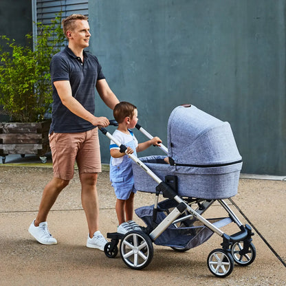 Father and child enjoying a smooth ride on the ABC Design Kiddie Ride On 2 Board, luxury modern furniture for strollers.