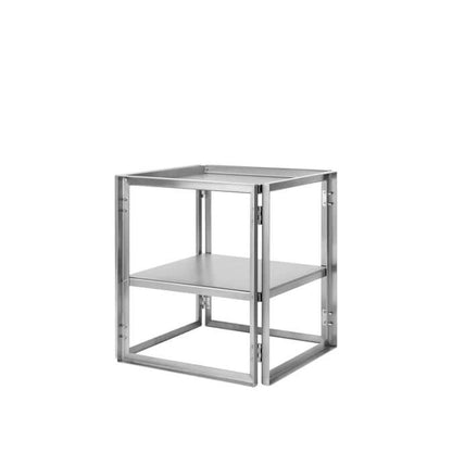 Luxury foldable side table by Kristina Dam Studio, sleek metal design for modern home decor, portable and perfect for small spaces.
