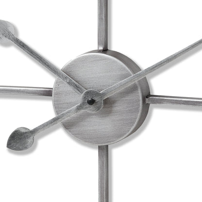 Silver Heart Skeleton Wall Clock close-up detail, luxury and designer modern furniture, featuring minimalist roman numeral design.