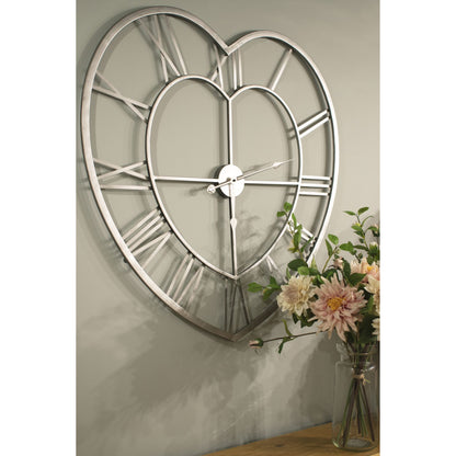 Luxury Silver Heart Skeleton Wall Clock with roman numerals, perfect for modern designer furniture and curated home decor collections.