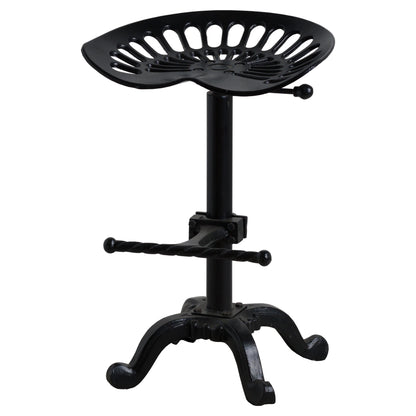 Luxurious adjustable tractor seat in black metal, embodying modern industrial design for high-end home decor.