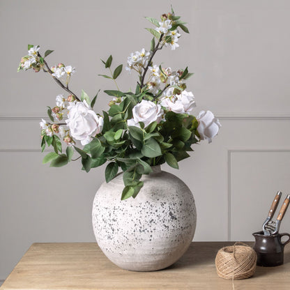 Tiber Stone Ceramic Vase from Luxury Furniture Collection, showcasing modern elegance in home decor with artificial floral arrangement.