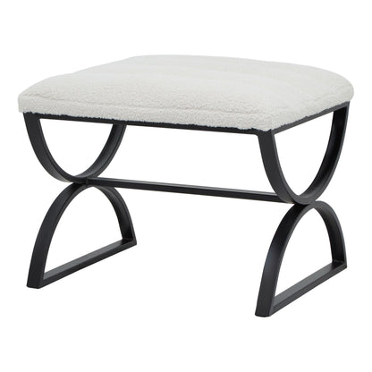 Luxurious boucle ribbed footstool with black metal frame, modern designer furniture for high-end home decor.