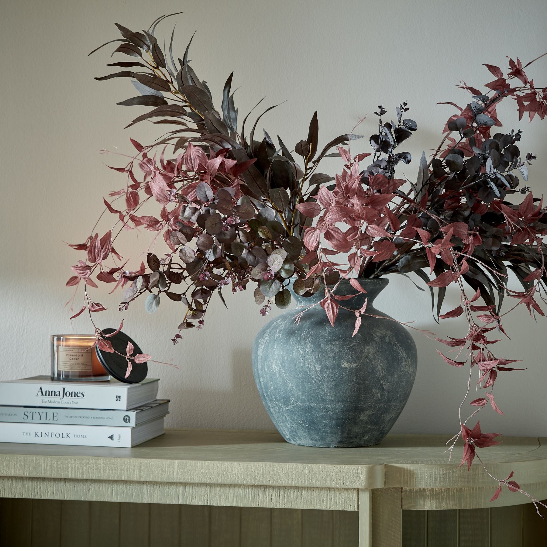 Alt Tag: Amalfi Grey Vase with artificial flowers, epitomizing luxury and modern design, perfect for premium and curated home decor.