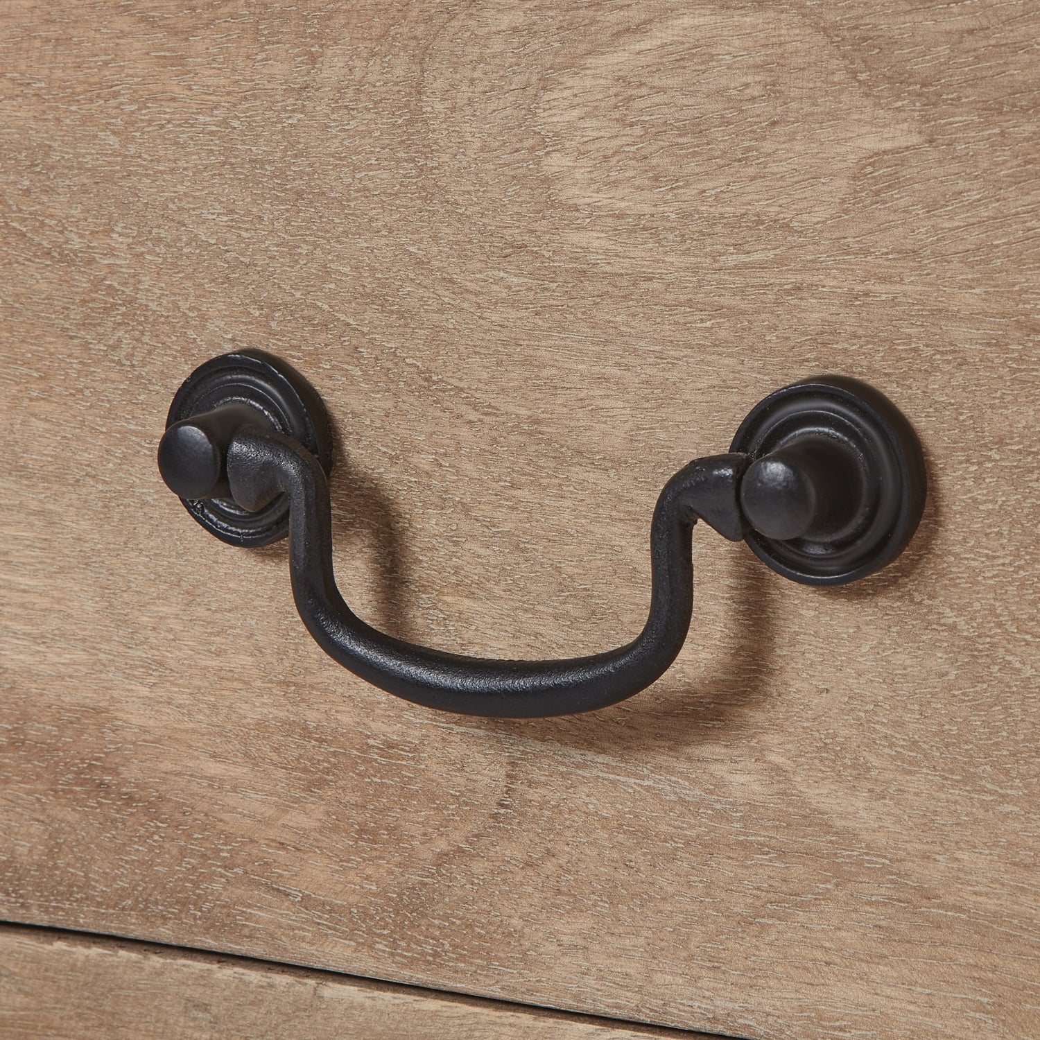 Close-up of black iron handle on Copgrove Collection 3 Drawer Console, showcasing luxury and designer furniture craftsmanship.