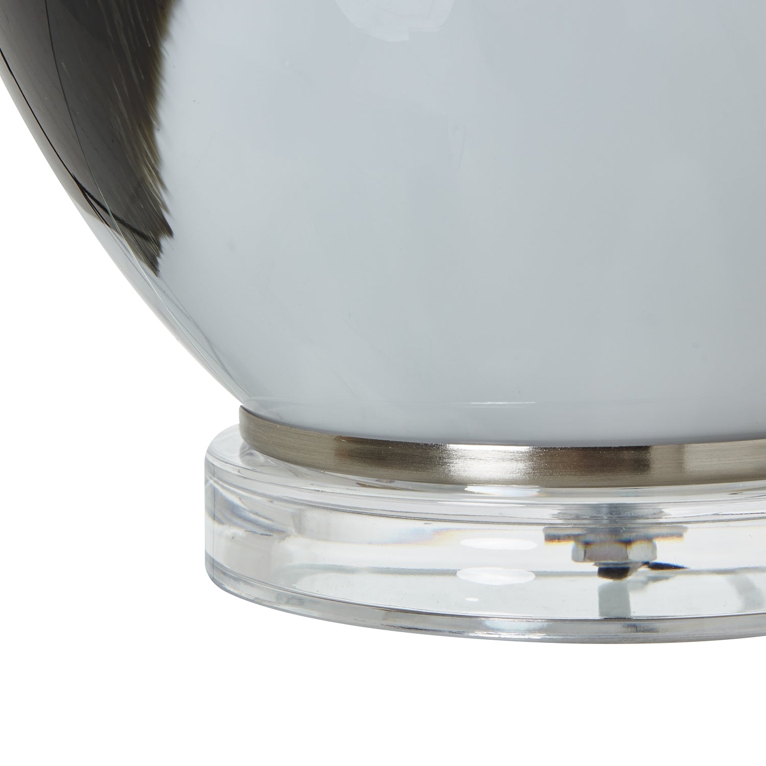 Close-up of grey glass table lamp base with ombre effect, showcasing premium luxury and designer home furnishings.