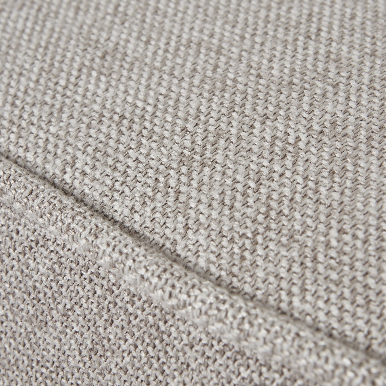 Close-up of oatmeal twill fabric on Lily Swivel Chair, showcasing luxury designer furniture for modern interiors.