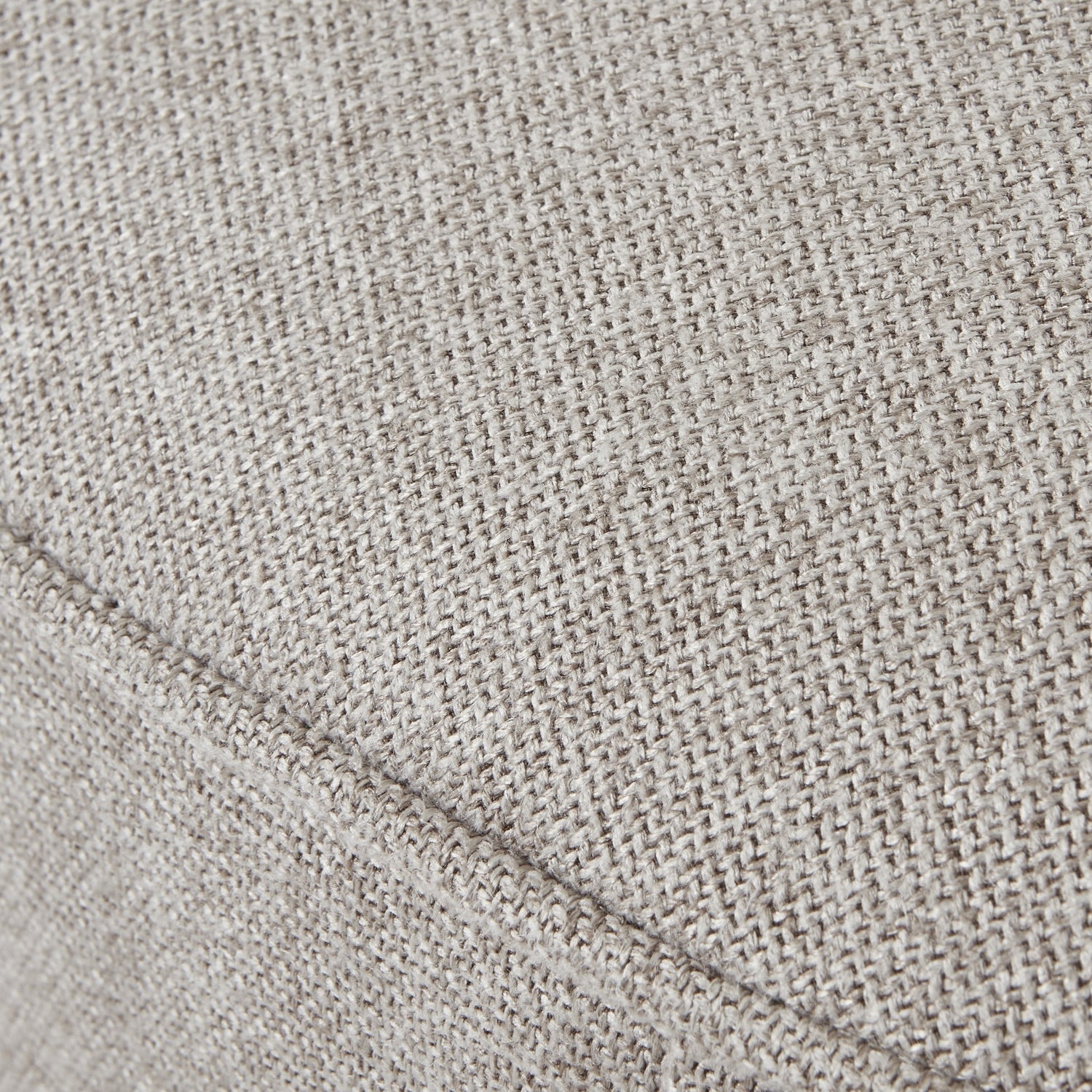 Detail of Lily Swivel Ottoman in Oatmeal Twill, showcasing luxury fabric texture—premium modern designer furniture for curated home decor.