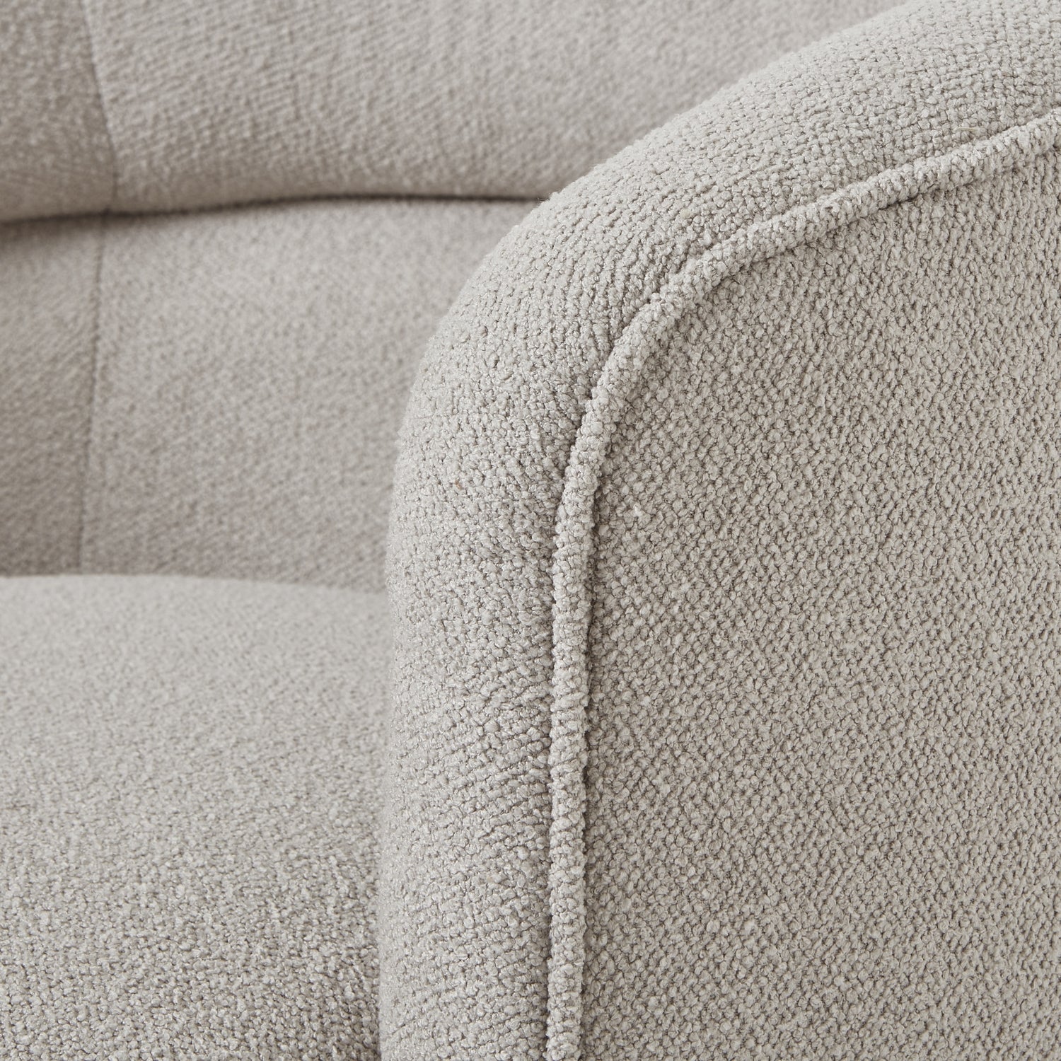 Close-up of Aspen Swivel Chair's plush upholstery, showcasing luxury modern furniture design for premium home decor.
