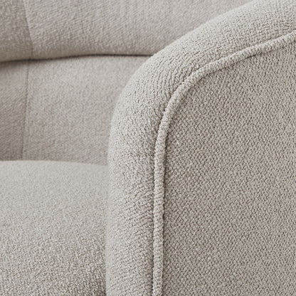Close-up of Aspen Swivel Chair's plush upholstery, showcasing luxury modern furniture design for premium home decor.