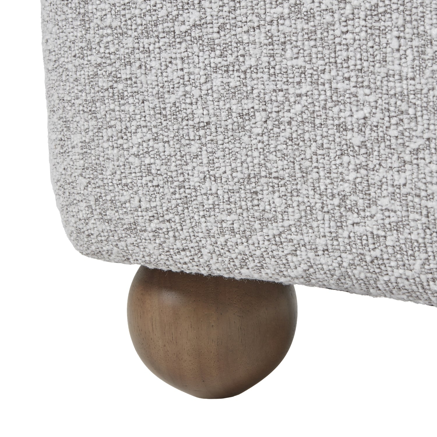 Close-up of Greige Hui Large Arm Chair leg, showcasing luxurious texture and modern design. Perfect for high-end home decor.