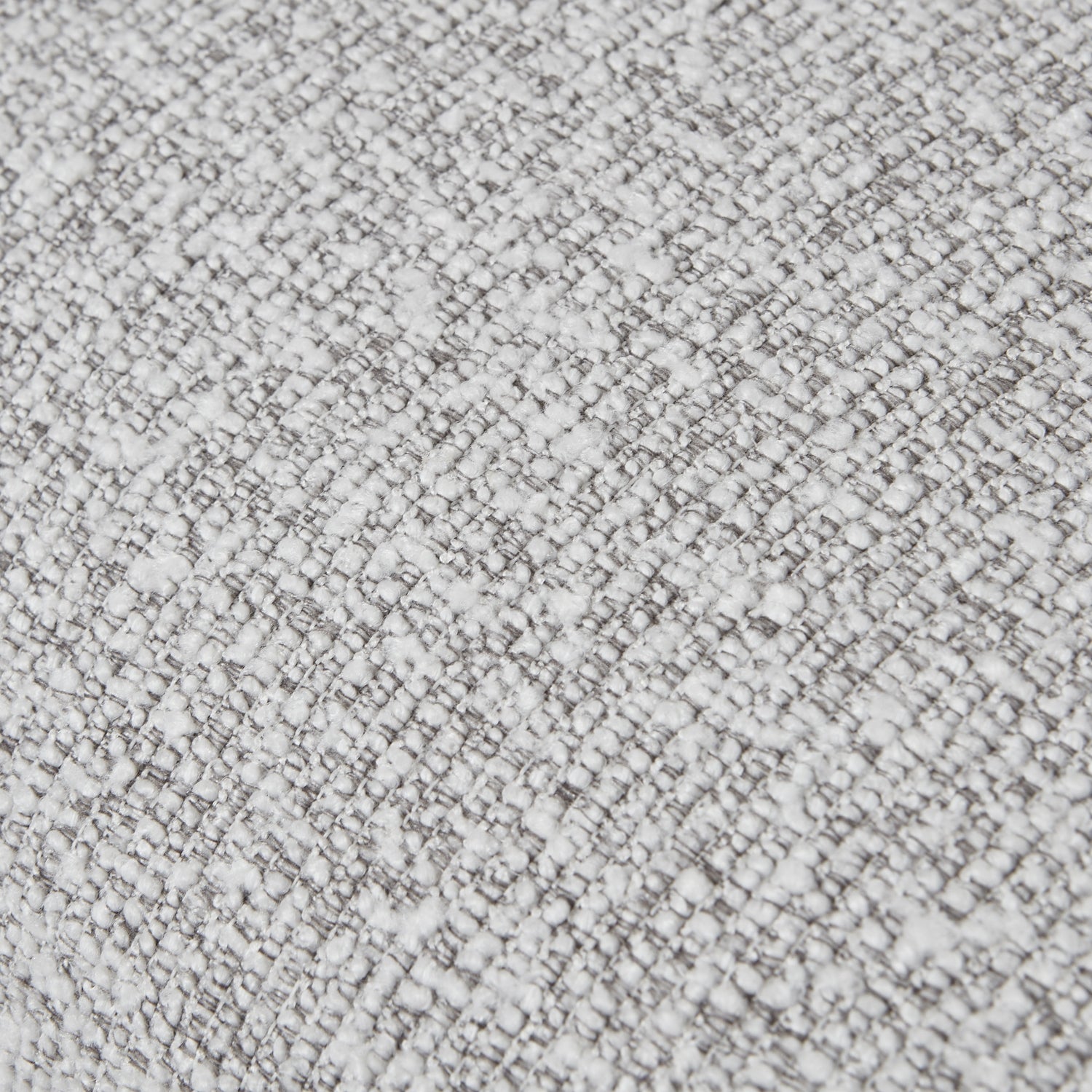 Detailed close-up of textured fabric from the Greige Hui Large Armchair, showcasing luxury, designer modern furniture.