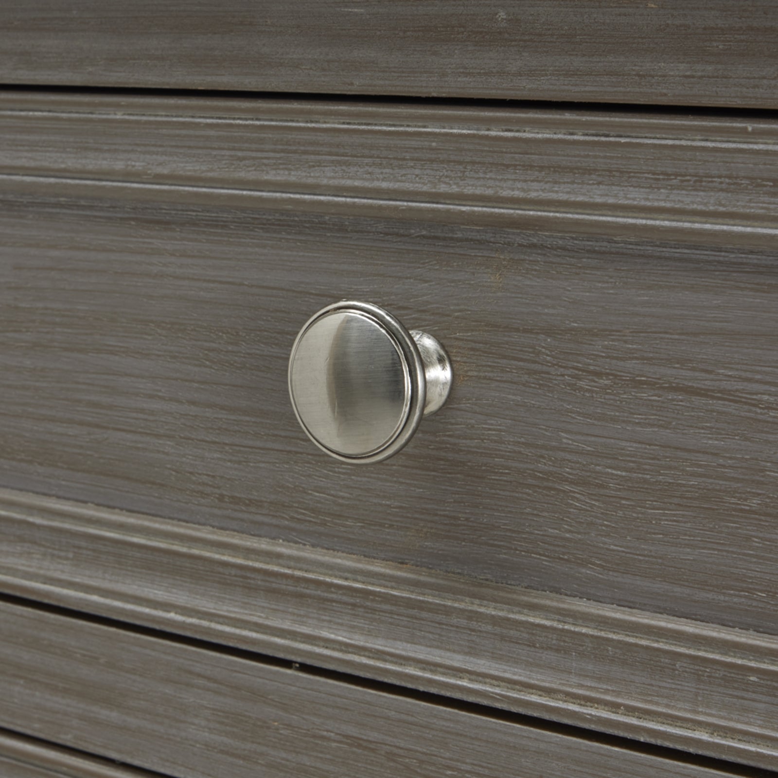 Close-up of The Serene Collection Two Over Two Console drawer knob, showcasing luxury and designer craftsmanship for modern furniture.