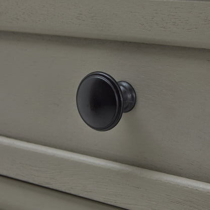 Close-up of handle on The Camden Collection Two Drawer Console Table. Luxury designer furniture with modern elegance.