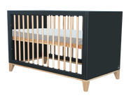 Modern baby crib with wooden slats and a dark frame, featuring minimalist design and sturdy construction for a nursery room.