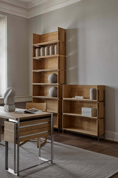 Luxury modern furniture setup featuring the Outline Desk with lacquered oak and brushed steel, perfect for high-end home decor.