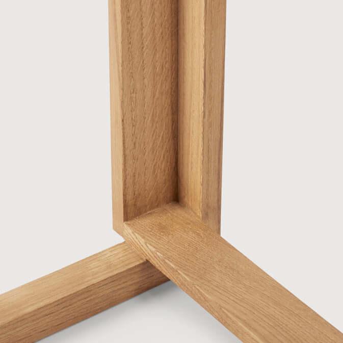 Minimalist oak frame from the Outline Bar Chair High, showcasing sustainable luxury and modern design for premium home decor.