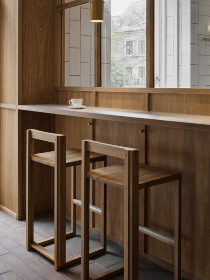 Elevate your space with the Outline Bar Chair High. Luxury, designer, and modern furniture for premium home decor.