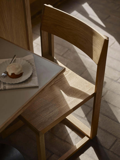 Outline Chair in oak - Luxury modern furniture with minimalist design for premium home decor. Designer piece from curated collection.