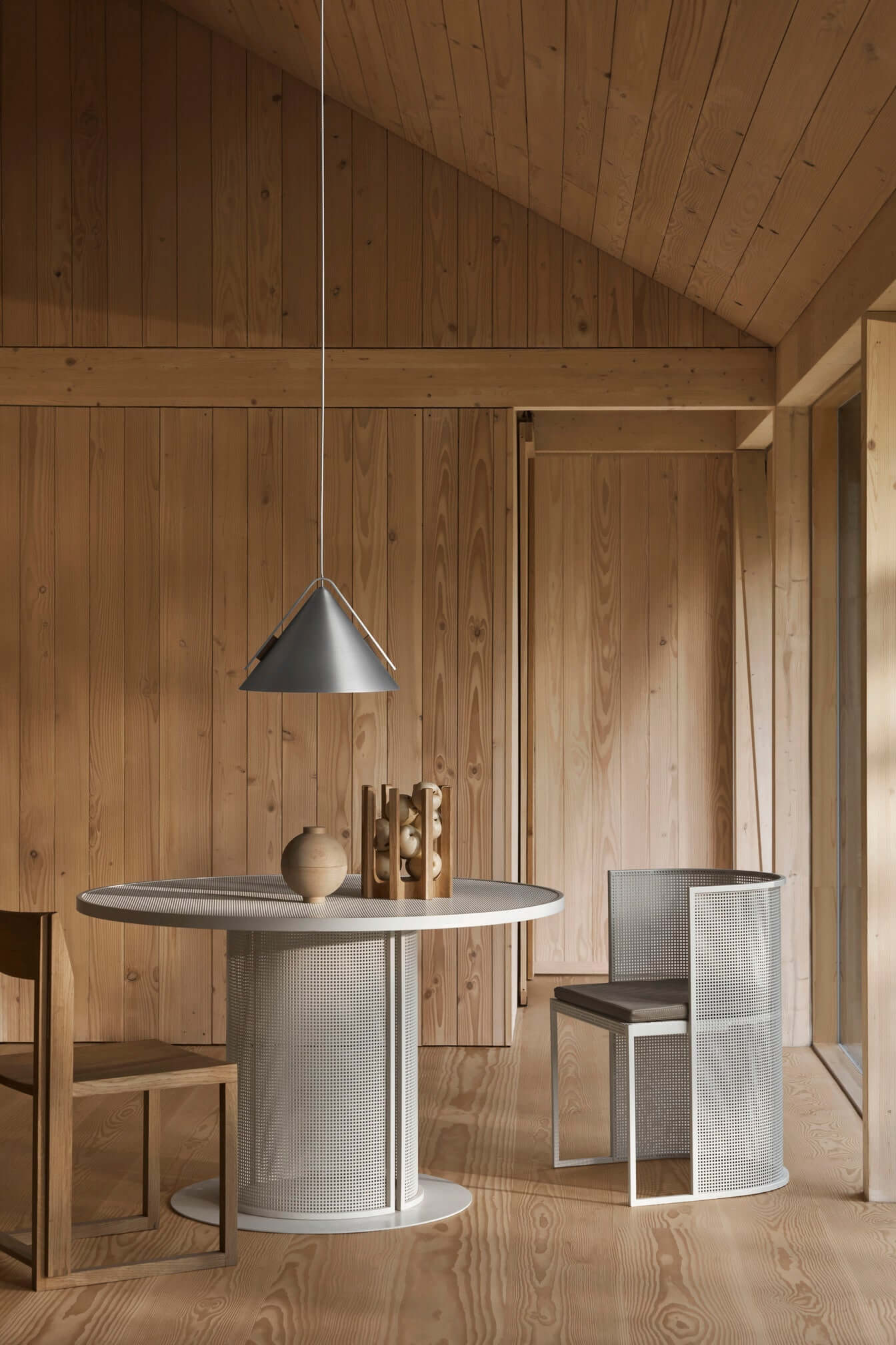 Outline Chair in a modern interior setting - Luxury and Designer Furniture by renowned vendor. Ideal for premium home decor.