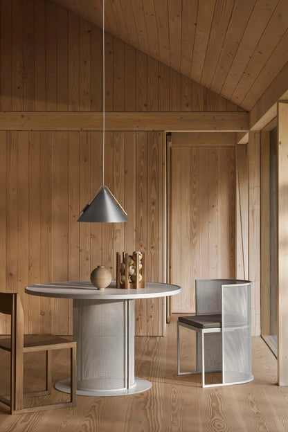 Outline Chair in a modern interior setting - Luxury and Designer Furniture by renowned vendor. Ideal for premium home decor.