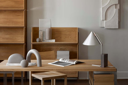Outline Desk in modern home office showcasing luxury furniture with brushed stainless steel and oak for elegant premium home decor.