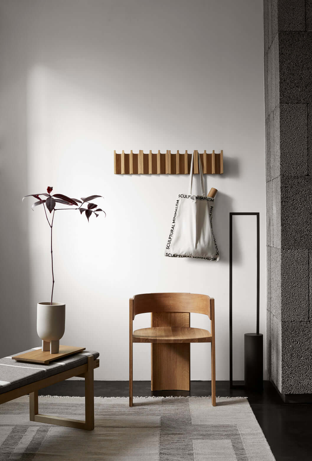 Luxury Collector Dining Chair in oak, showcasing modern design in a stylish, minimalist room. Perfect for high-end home decor.