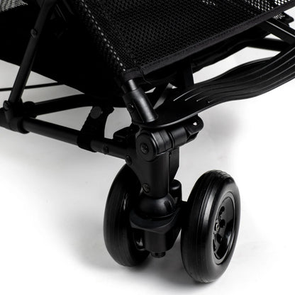 Close-up of Roma Rizzo 2 Teddy Cream Stroller wheel and frame, showcasing luxury, modern design, and lightweight convenience.