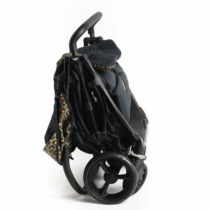 Roma Gemini 2 Stroller folded, modern luxury furniture design for urban parents, premium home furnishings, easy navigation.