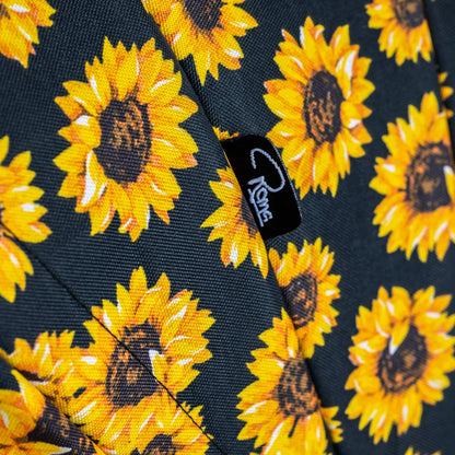 Close-up of Roma Capsule 3 stroller fabric in Sunflower pattern, showcasing vibrant design for luxury and modern furniture style.