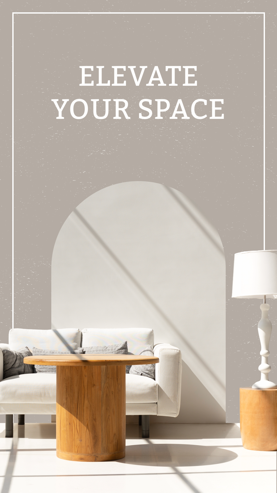 Modern living room interior with a white couch, wooden table, and lamp, featuring "Elevate Your Space" text on the wall.