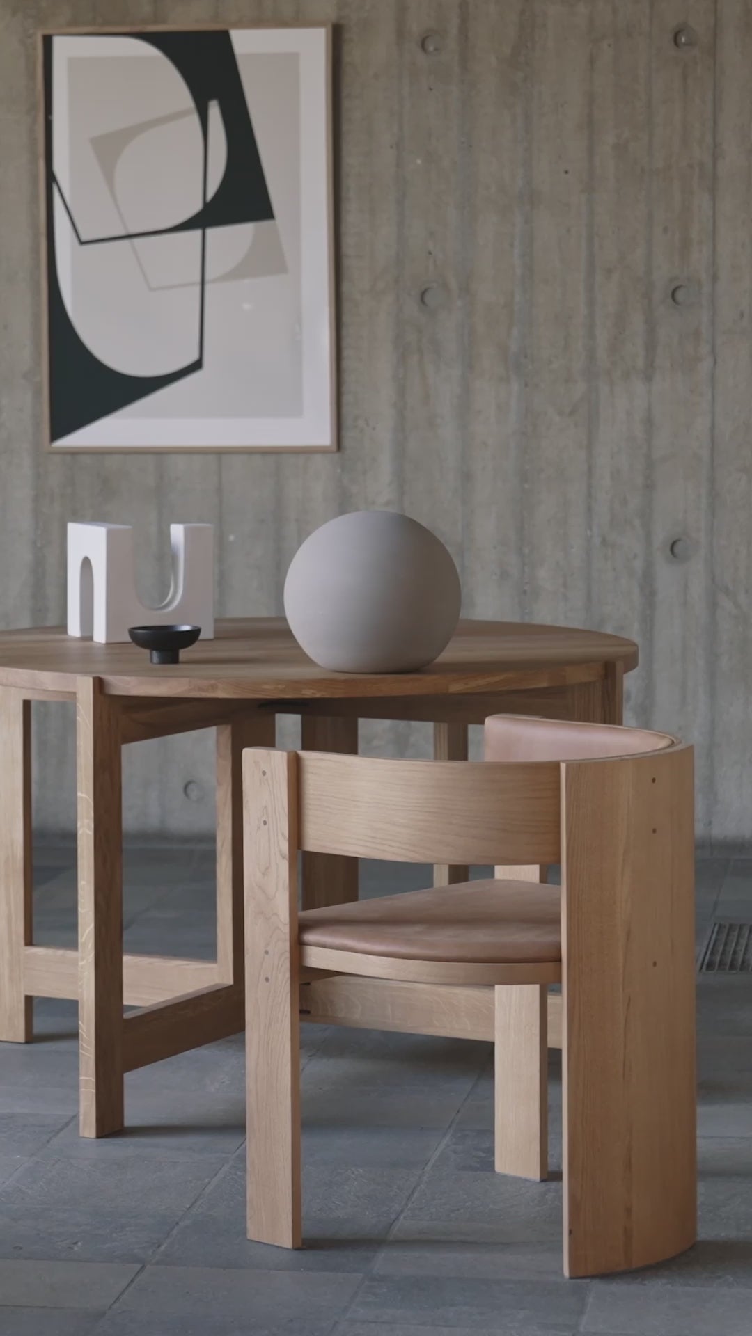 Luxury Designer Furniture - Collector Dining Chair in oak with leather upholstery, modern piece in a curated furniture collection setting.
