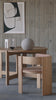 Luxury Designer Furniture - Collector Dining Chair in oak with leather upholstery, modern piece in a curated furniture collection setting.